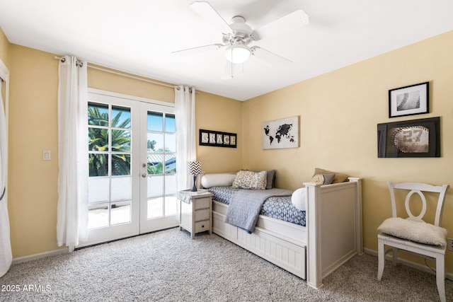 carpeted bedroom with french doors, access to outside, ceiling fan, and baseboards