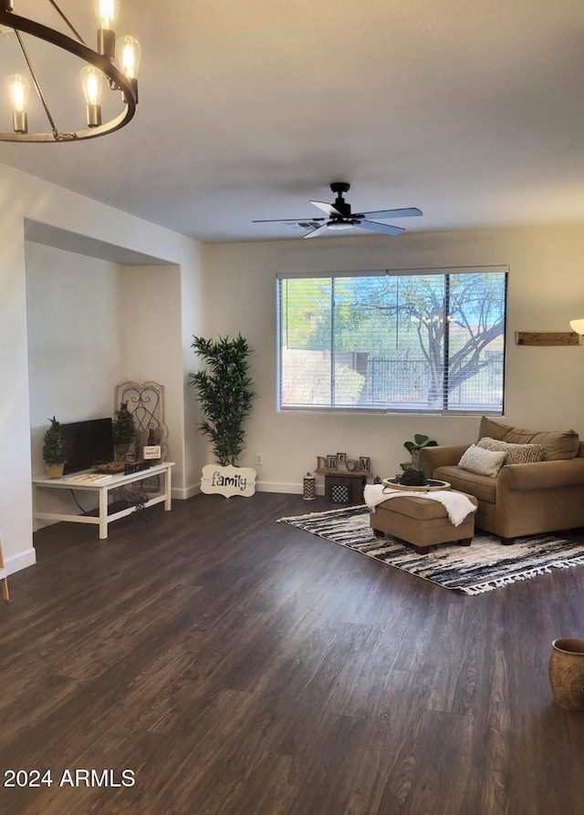 interior space featuring dark hardwood / wood-style flooring, ceiling fan, and a healthy amount of sunlight