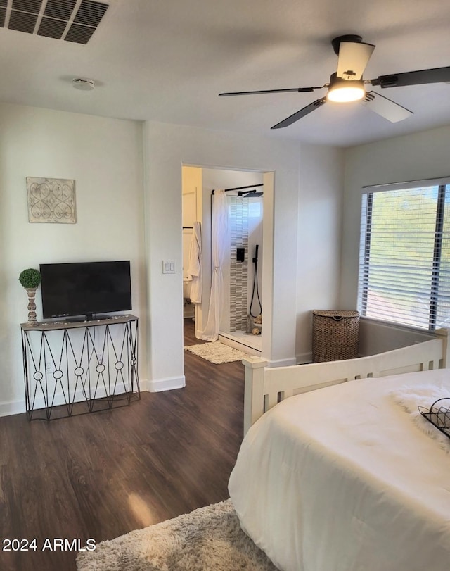 bedroom with ceiling fan and dark hardwood / wood-style flooring