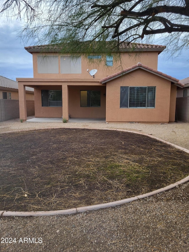 view of front of home featuring a patio area