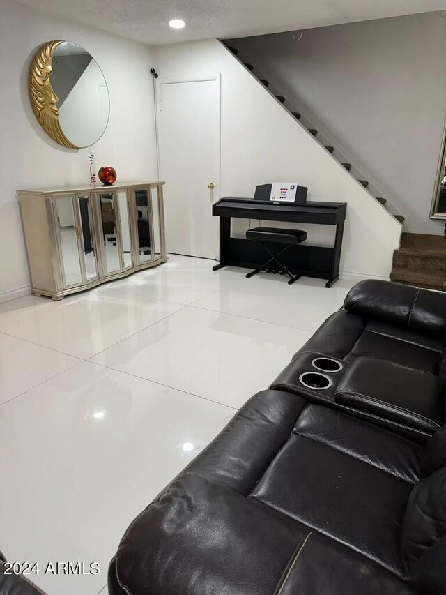 living room featuring tile patterned floors