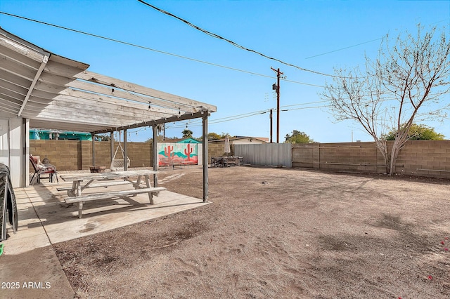 view of yard featuring a patio area and a playground