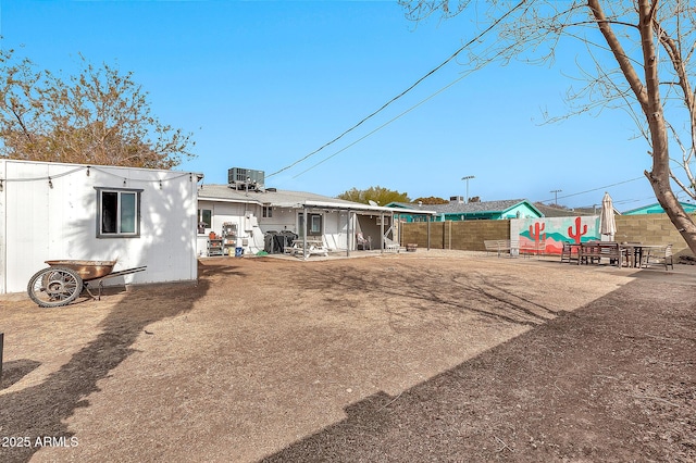 exterior space featuring central AC unit