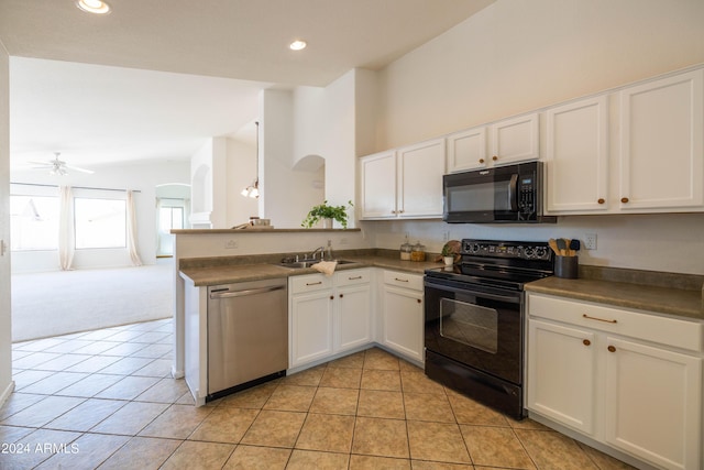 kitchen with sink, white cabinetry, light tile patterned floors, kitchen peninsula, and black appliances