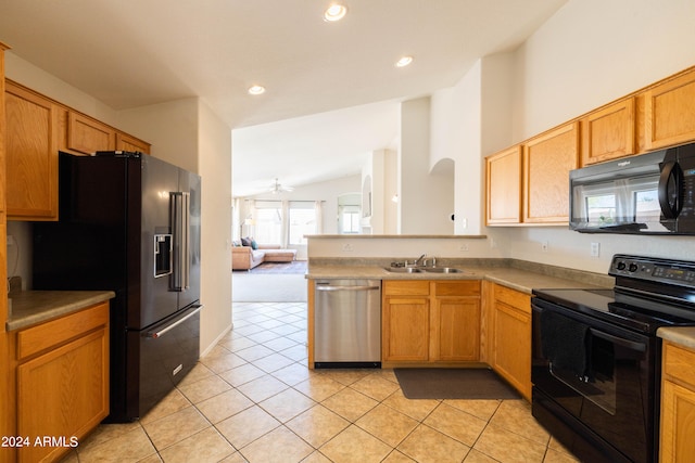 kitchen featuring lofted ceiling, light colored carpet, ceiling fan, sink, and black appliances