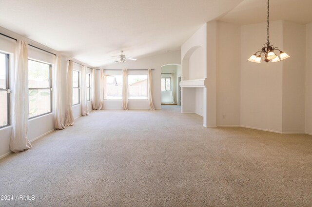 carpeted living room featuring ceiling fan and vaulted ceiling