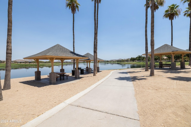 exterior space featuring a water view and a gazebo