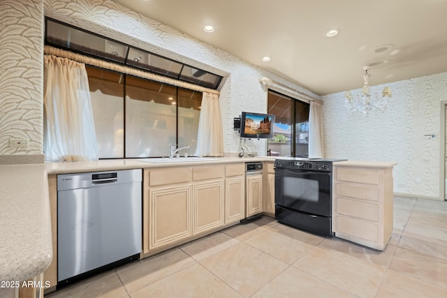 kitchen with black range with electric cooktop, a sink, light countertops, dishwasher, and wallpapered walls