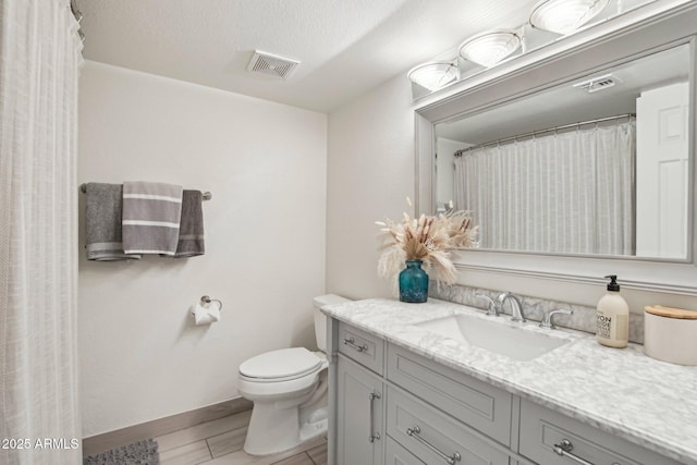 5119 E Shaw Butte Dr, Scottsdale, AZ 85254 - full bath featuring vanity, toilet, and baseboards