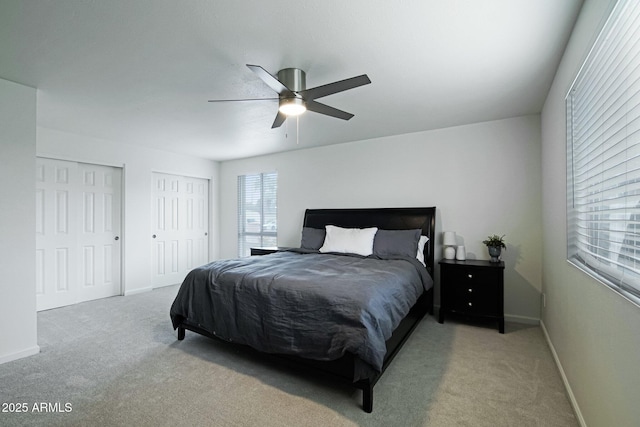 5119 E Shaw Butte Dr, Scottsdale, AZ 85254 - bedroom featuring carpet flooring, multiple closets, and baseboards