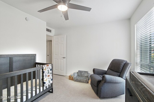 5119 E Shaw Butte Dr, Scottsdale, AZ 85254 - carpeted bedroom with a crib and ceiling fan