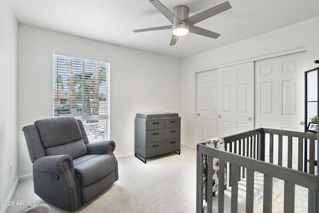 5119 E Shaw Butte Dr, Scottsdale, AZ 85254 - bedroom with light carpet, a closet, baseboards, and ceiling fan