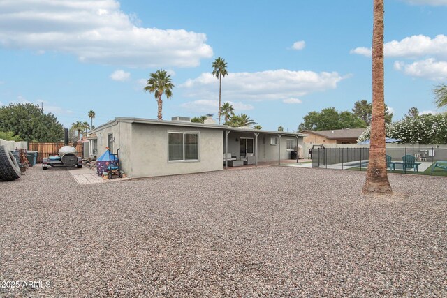 5119 E Shaw Butte Dr, Scottsdale, AZ 85254 - view of front of home with fence, stucco siding, and a patio