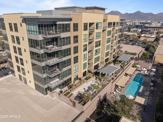 view of building exterior featuring a mountain view