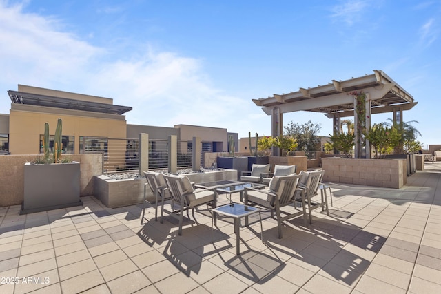 view of patio featuring an outdoor fire pit