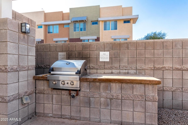 view of patio with a grill