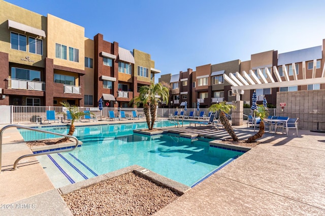 view of pool with a patio area and a pergola