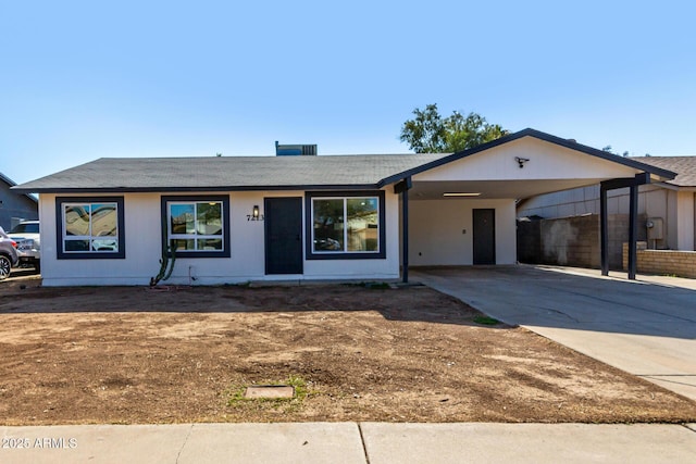 single story home with a carport