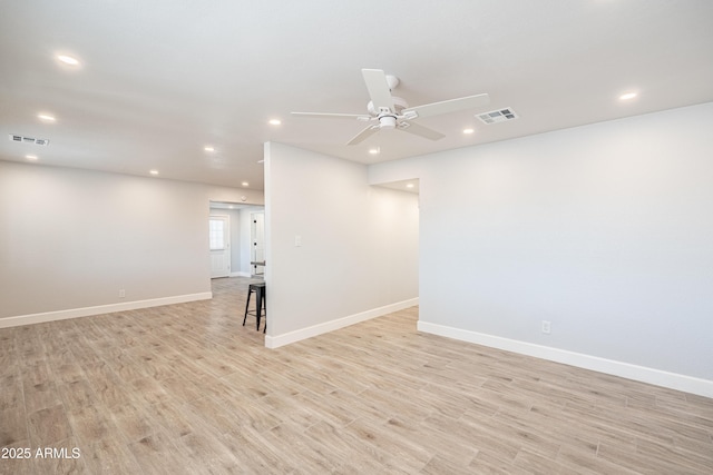 1135 E 4th St, Casa Grande, AZ 85122 - unfurnished room featuring recessed lighting, light wood-style floors, a ceiling fan, and baseboards