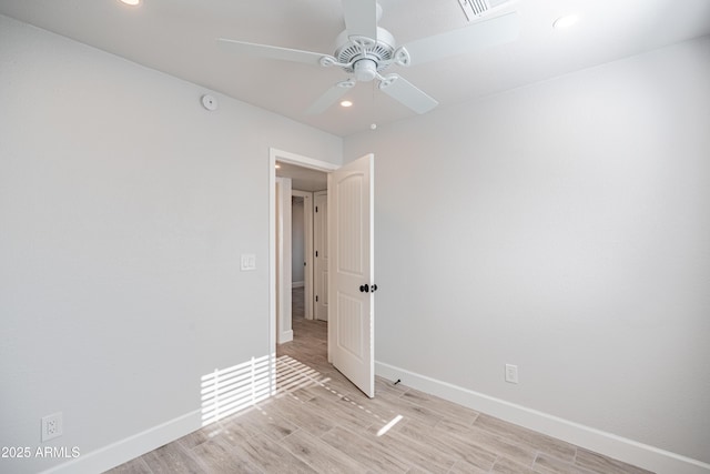 1135 E 4th St, Casa Grande, AZ 85122 - unfurnished room with ceiling fan, light wood-type flooring, baseboards, recessed lighting, and a smoke detector