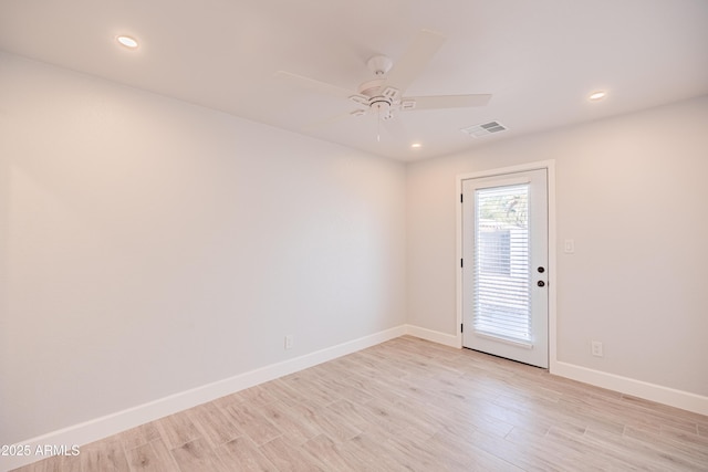 1135 E 4th St, Casa Grande, AZ 85122 - unfurnished room featuring light wood finished floors, a ceiling fan, baseboards, and recessed lighting
