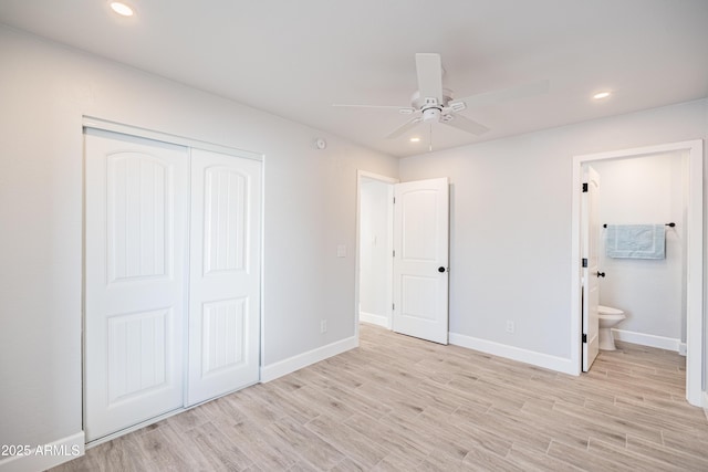 1135 E 4th St, Casa Grande, AZ 85122 - unfurnished bedroom featuring light wood-style floors, baseboards, a closet, ensuite bath, and recessed lighting