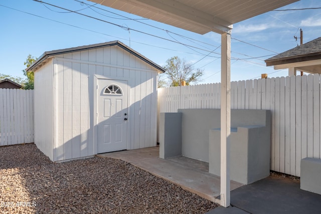 1135 E 4th St, Casa Grande, AZ 85122 - view of shed with a fenced backyard