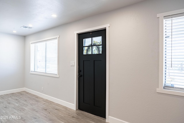 1135 E 4th St, Casa Grande, AZ 85122 - foyer with light wood-style floors, baseboards, and recessed lighting