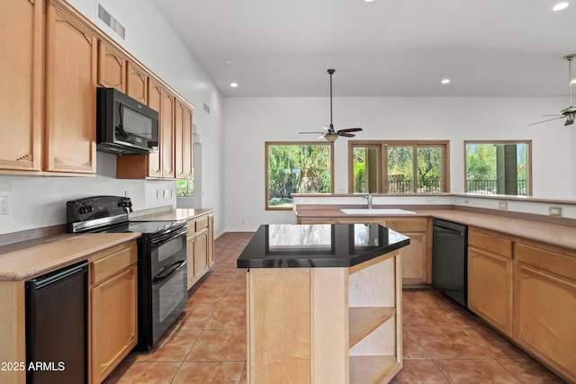 33519 N 62nd St, Cave Creek, AZ 85331 - kitchen with black appliances, light tile patterned flooring, ceiling fan, visible vents, and recessed lighting