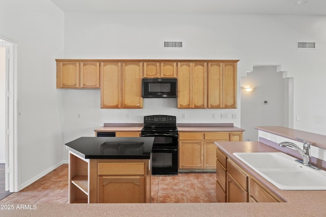 33519 N 62nd St, Cave Creek, AZ 85331 - kitchen with black appliances, a sink, visible vents, and light tile patterned floors