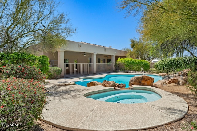 33519 N 62nd St, Cave Creek, AZ 85331 - view of swimming pool featuring a fenced in pool, fence, a diving board, ceiling fan, and an in ground hot tub