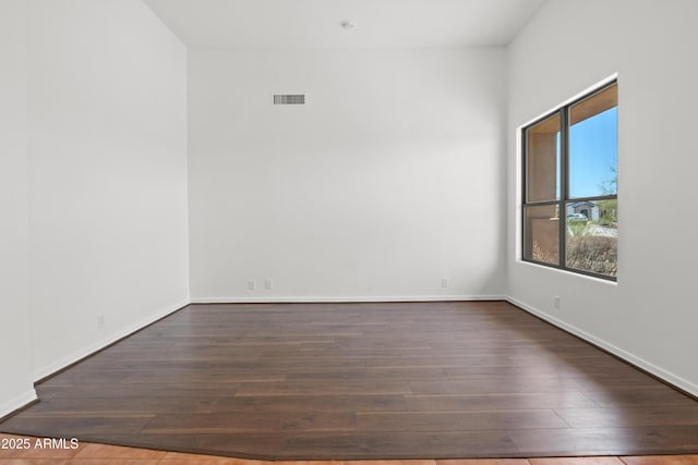 33519 N 62nd St, Cave Creek, AZ 85331 - empty room with baseboards, wood finished floors, and visible vents
