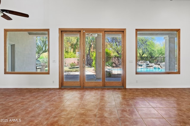 33519 N 62nd St, Cave Creek, AZ 85331 - doorway featuring ceiling fan, baseboards, and tile patterned flooring