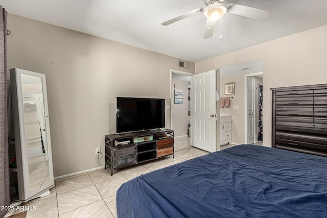 bedroom featuring light tile patterned flooring, baseboards, and ceiling fan