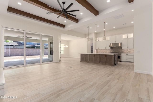1645 E Minton St, Mesa, AZ 85203 - unfurnished living room featuring light wood-style flooring, ceiling fan with notable chandelier, visible vents, and beam ceiling