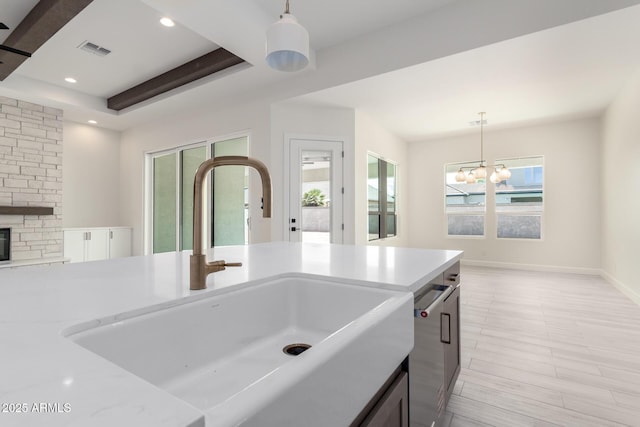 1645 E Minton St, Mesa, AZ 85203 - kitchen with a sink, visible vents, light countertops, and a wealth of natural light