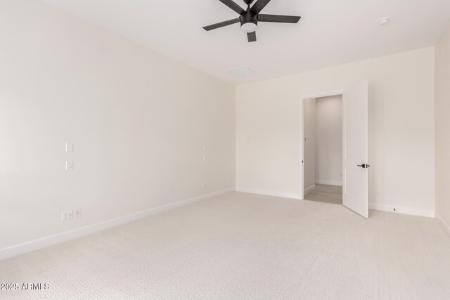 1645 E Minton St, Mesa, AZ 85203 - unfurnished room featuring baseboards, a ceiling fan, and light colored carpet