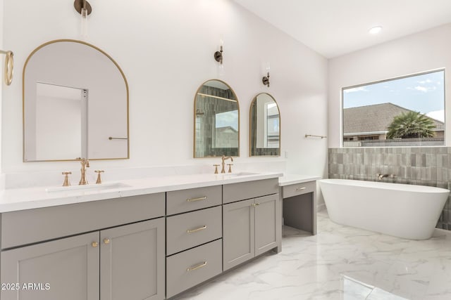 1645 E Minton St, Mesa, AZ 85203 - bathroom with a sink, double vanity, a freestanding tub, and marble finish floor