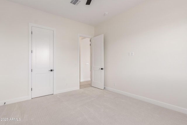 1645 E Minton St, Mesa, AZ 85203 - unfurnished bedroom featuring visible vents, baseboards, and light colored carpet