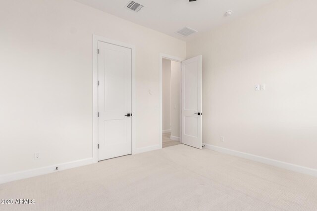 1645 E Minton St, Mesa, AZ 85203 - unfurnished bedroom with visible vents, baseboards, and carpet