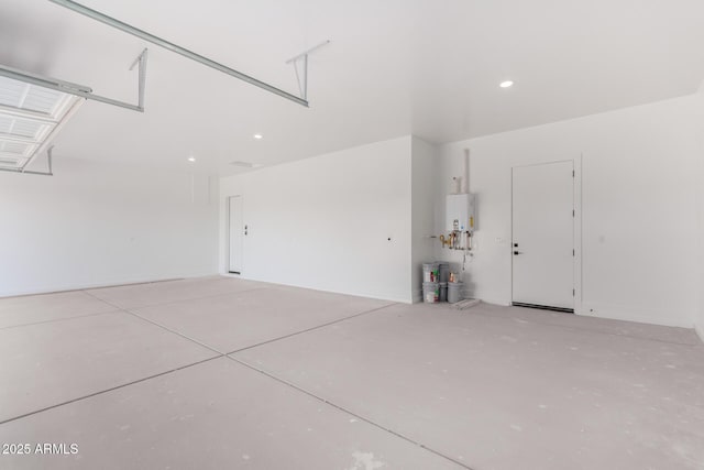 1645 E Minton St, Mesa, AZ 85203 - garage featuring water heater and recessed lighting