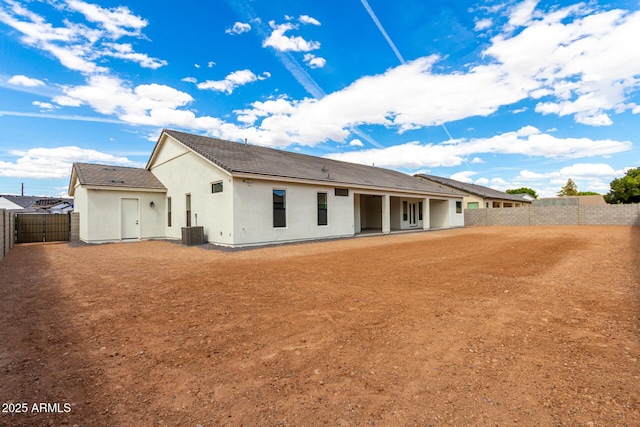 1645 E Minton St, Mesa, AZ 85203 - rear view of house with central air condition unit, a patio, a fenced backyard, and stucco siding