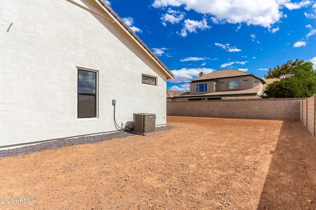 1645 E Minton St, Mesa, AZ 85203 - view of yard with central AC unit and a fenced backyard