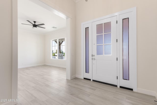 1645 E Minton St, Mesa, AZ 85203 - entrance foyer featuring crown molding, ceiling fan, light wood finished floors, and baseboards