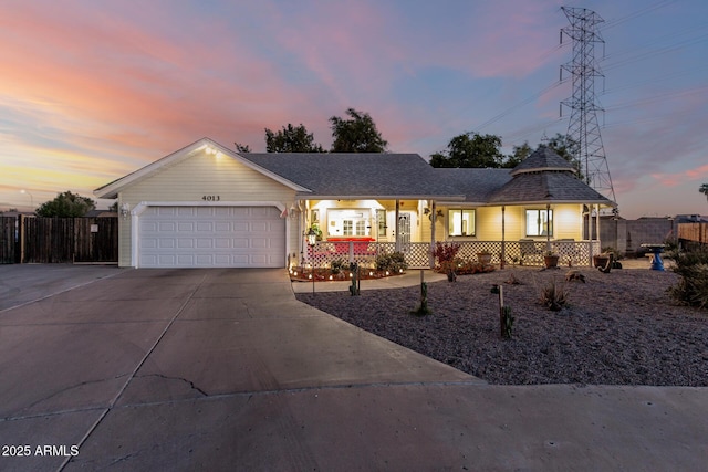 4013 E Delta Cir, Mesa, AZ 85206 - view of front facade with covered porch, driveway, and an attached garage