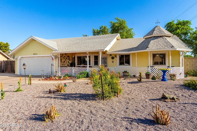 4013 E Delta Cir, Mesa, AZ 85206 - ranch-style house with a porch, a garage, driveway, and roof with shingles
