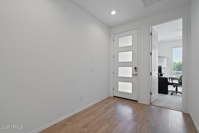 6313 N 68th Dr, Glendale, AZ 85303 - entrance foyer with wood finished floors, baseboards, and recessed lighting