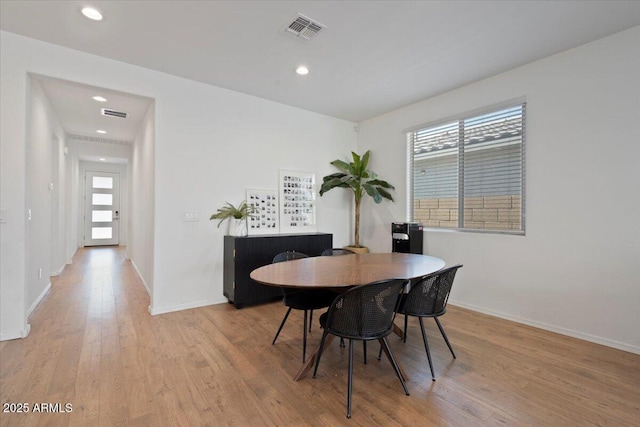 6313 N 68th Dr, Glendale, AZ 85303 - dining room featuring light wood finished floors, healthy amount of natural light, baseboards, and recessed lighting