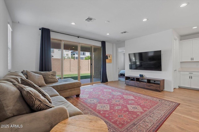 6313 N 68th Dr, Glendale, AZ 85303 - living room with light wood-type flooring and recessed lighting