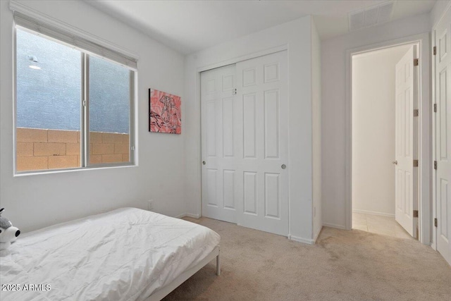 6313 N 68th Dr, Glendale, AZ 85303 - bedroom featuring carpet, a closet, and baseboards